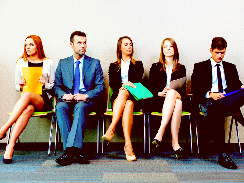 five people waiting for an interview