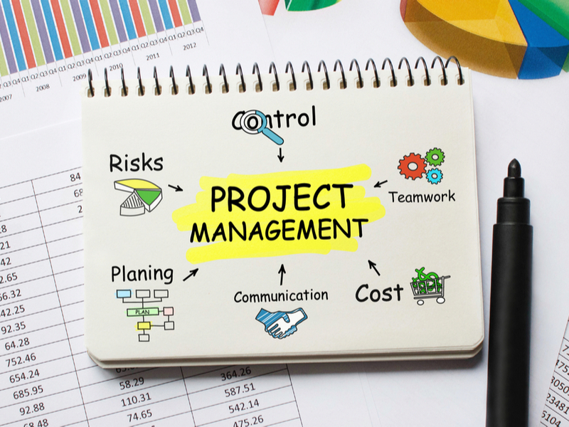a notebook with the label "project management"