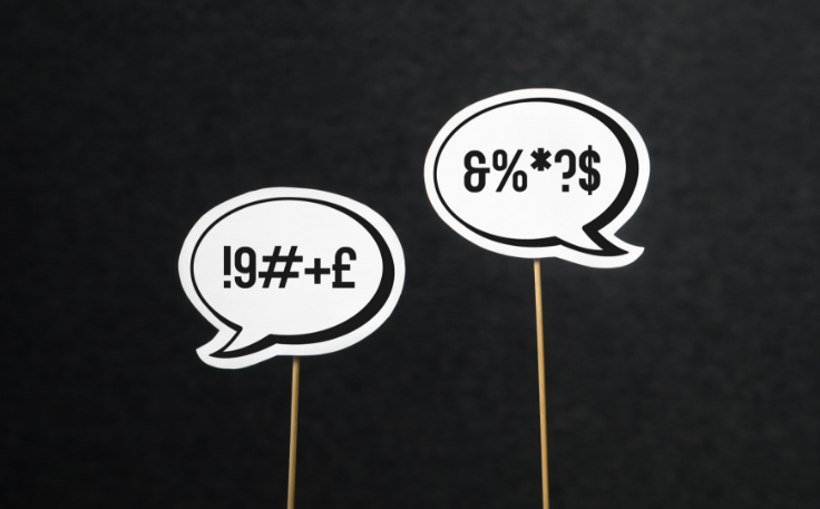 two bubble speech with unidentified symbols representing negative reviews