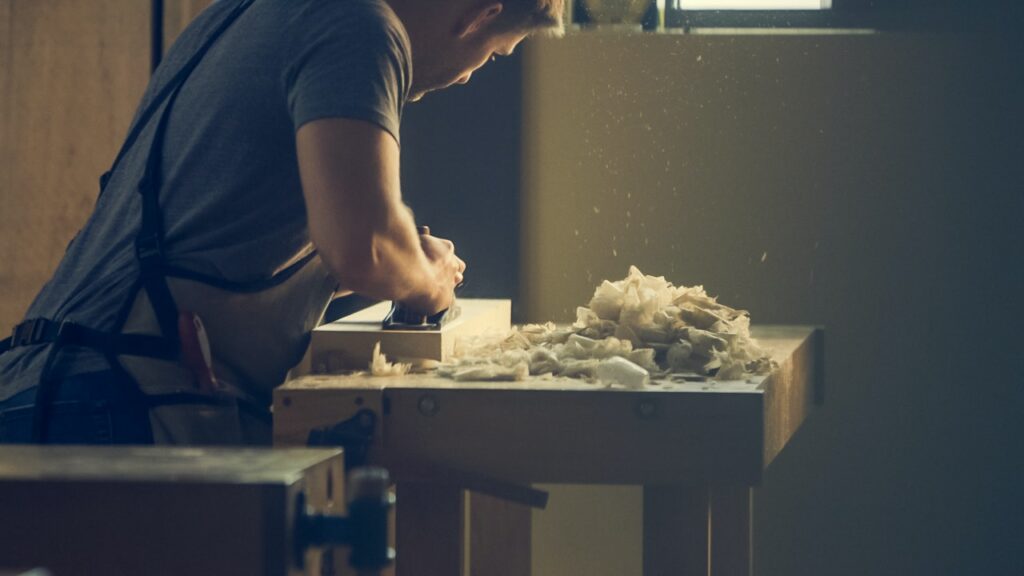 Man working on a piece of wood
